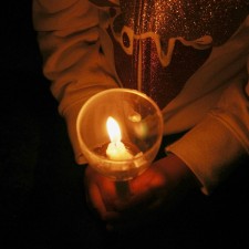 Hands holding candle_lighter